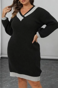 Detail of V-neckline and contrast trim on black slim-fit knitted mini dress for women