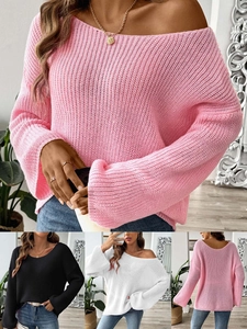Detail of off-shoulder cable knit sweater showing pink, black and white color options