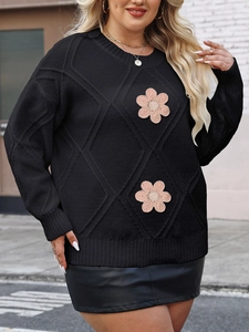 Women's plus size black knit sweater featuring diamond texture and pink flower embroidery