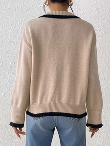 Chic beige long sleeve knit sweater with polo collar and contrasting black striped edges