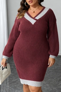 Close-up of deep burgundy knit dress featuring V-neckline and contrast striped trim