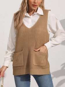 Detail view of khaki knit V-neck vest with large patch pockets and side slit hem