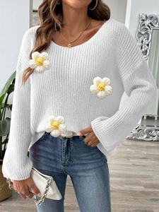 White knit sweater with floral 3D crochet details and elegant off-shoulder neckline