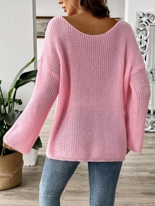 Pink oversized chunky knit sweater with back V-neck and bow embroidery detail
