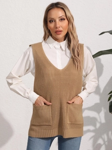 Detail view of khaki knit V-neck vest featuring two functional front pockets and thick texture