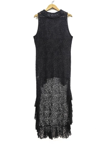 Sleeveless black lace dress with irregular high-low hem and tiered ruffle design