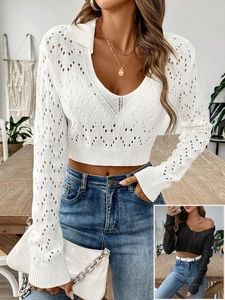Detailed knit texture and hollow diamond pattern on a cropped women's polo sweater