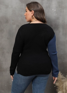 Back view of a plus size knit sweater with contrast patchwork and soft ribbed texture