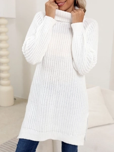 Macro shot of white oversized turtleneck knit sweater with thick textured stitching