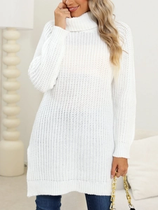 Detail of white high-neck cable knit dress showing thick texture and soft long sleeves
