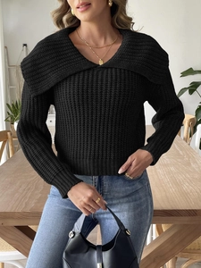 Women's black chunky knit sweater with wide shawl collar and deep v-neck design