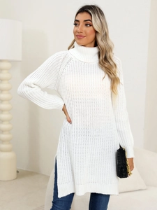 Detail shot of the side split and thick knit texture on this white turtleneck sweater