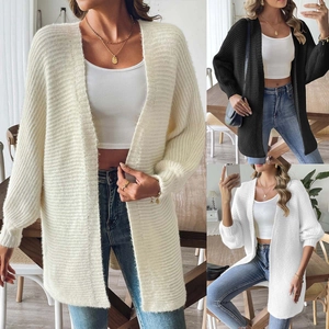 Détails de cardigans en maille à manches longues en beige noir et blanc avec texture douce