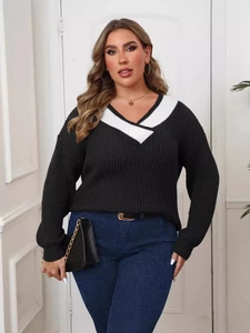 Women's plus size knit sweater with black and white color block V-neck design