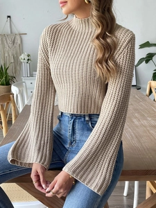 Women's cropped ribbed knit sweater with flare sleeves and mock neck in beige