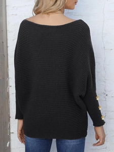 Women's black batwing sleeve knit sweater with golden button accents and loose fit
