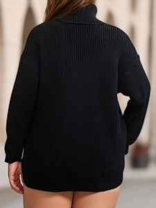 Women's black turtleneck split oversized knit sweater with elegant pleated texture
