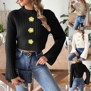 Detailed knit texture of flare sleeve cropped sweater with 3D floral pearl accents