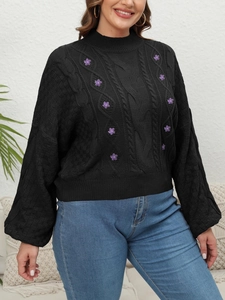 Women's black cable knit sweater with purple flower embroidery and lantern sleeves