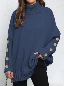 Women's oversize turtleneck knit sweater in navy blue with decorative side buttons