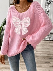 Maglione in maglia rosa da donna con scollo a V e grande fiocco in pizzo bianco applicato