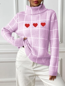 Lavender high neck plaid knit sweater with red heart embroidery on a female model