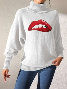 Close-up of sparkling sequin red lip embroidery on the white high neck knit sweater