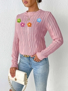 Pink cable knit sweater for women featuring colorful 3D handmade floral appliques