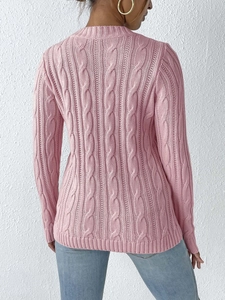Pink cable knit sweater for women featuring crew neck and long sleeves in a soft texture