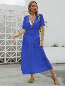 Deep V-neck royal blue sheer mesh beach cover-up with waist cinching and side slit details