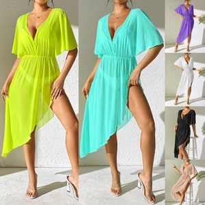 Detail of sheer beach cover-up with V-neck, batwing sleeves and asymmetrical hem in six colors