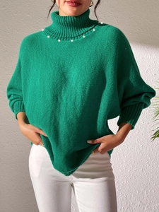Elegant green turtleneck sweater with pearl collar and dropped shoulders for women