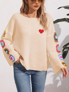 Women beige off-shoulder loose knit sweater with crochet floral sleeves and heart patch