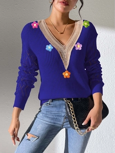 Women's V-neck knit sweater with beige lace trim and colorful 3D crochet flower appliques