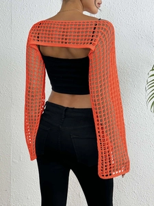 Detailed back view of orange crochet knit crop top with openwork mesh texture