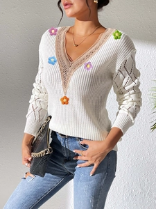 White V-neck sweater for women with lace stitching and 3D colorful crochet flowers