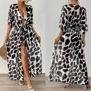 Detail view of leopard print long chiffon cover-up with drawstring waist and deep V-neck
