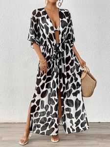 Women's leopard print mesh beach cover-up with belted waist and long split hemline