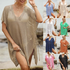 Detailed knit texture and side drawstring slit of the crochet beach cover-up dress