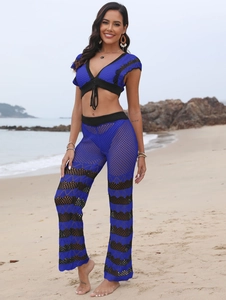 Women's beach crochet two-piece set featuring blue and black color-block deep V crop top and pants