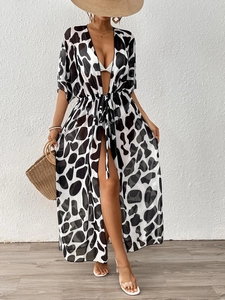 Detail view of long leopard print beach cover-up with adjustable drawstring waist
