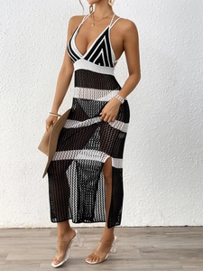 Women's black and white crochet striped halter maxi dress with hollow out knit detail