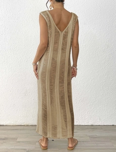 Detailed back view of a khaki crochet knit maxi dress with a deep V-neck and hollow texture