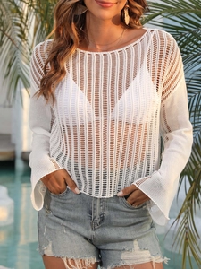 Women's white crochet knit beach cover-up with stylish flared sleeves and hollow design