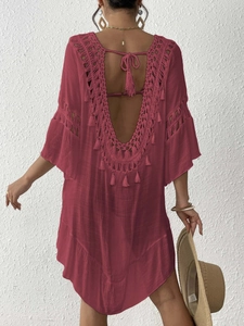 Women's rose red crochet beach cover-up featuring fringe tassels and an open back