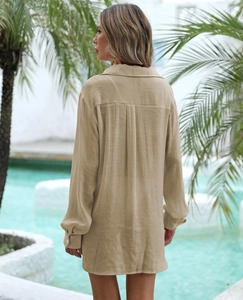 Outdoor shot of khaki beach cover-up with stylish back pleat detail and drop shoulders