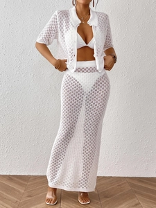 Ensemble blanc deux pièces en crochet avec haut polo et jupe longue ajourée pour femme