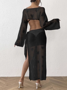 Detailed back view of black heart crochet cover-up set with lace-up top and maxi skirt