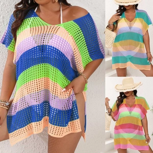 Detail of colorful striped crochet beach cover-up featuring hollow knit and side slits
