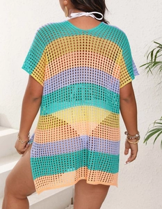 Detail of colorful striped crochet cover-up with textured knit and high side slit